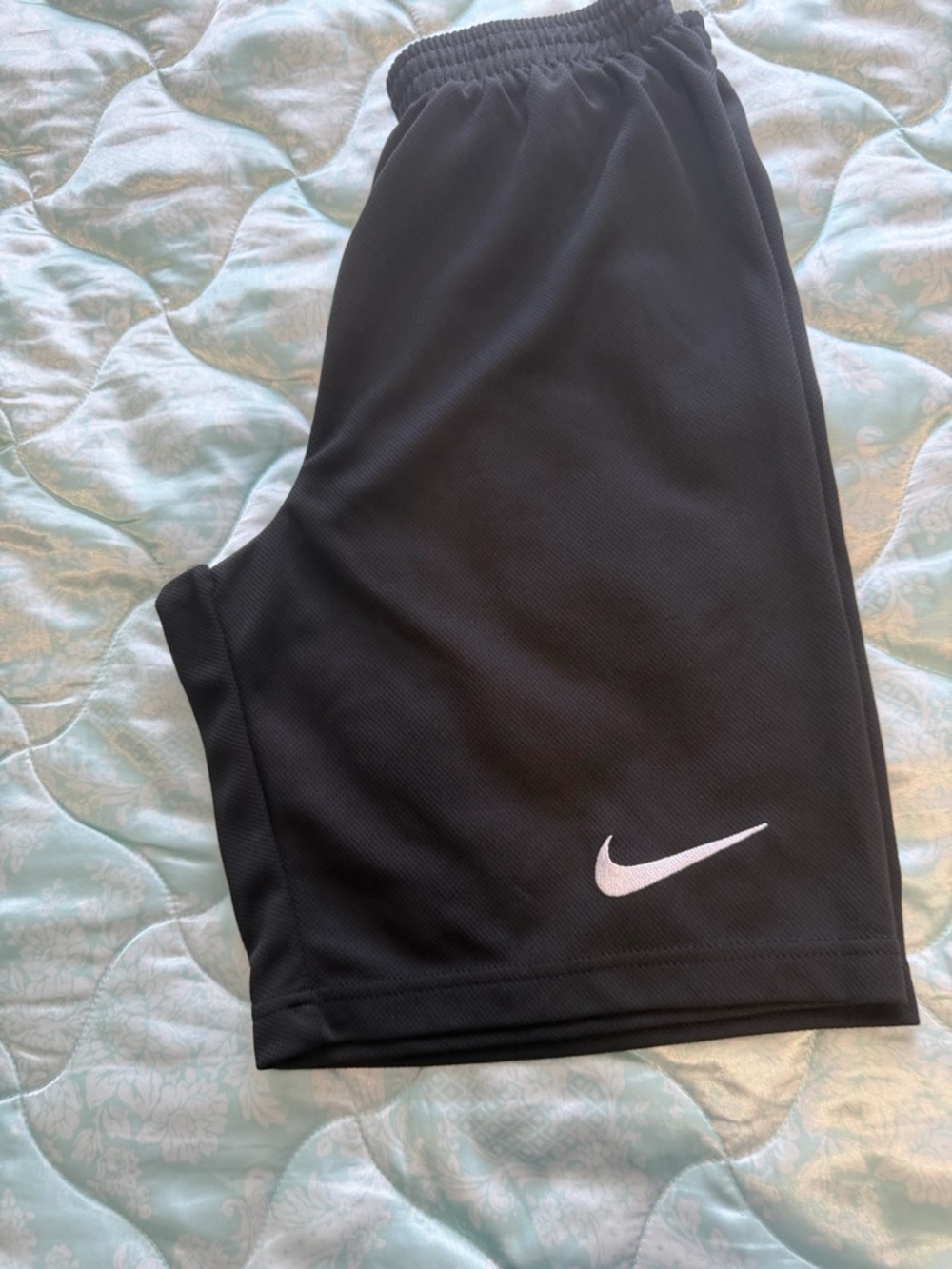 Nike Black Athletic Shorts with White Swoosh Accent